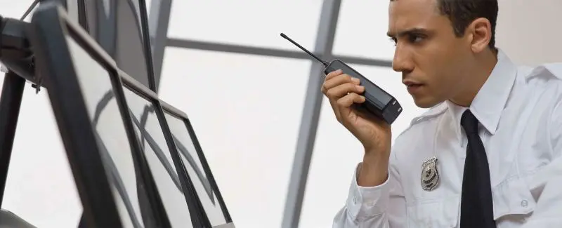 A man holding a cell phone to his ear.